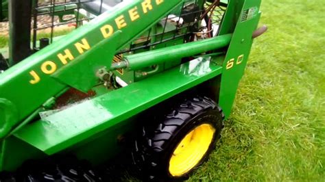 starting a john deere skid steer